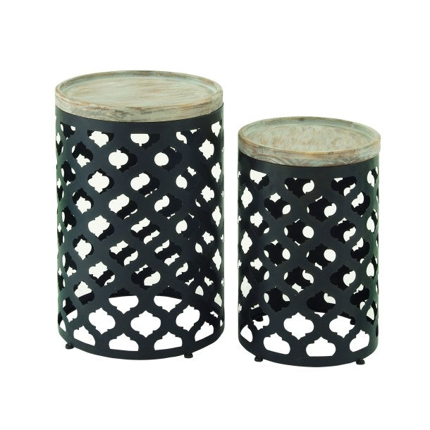 Two cylindrical accent tables, the first with a larger geometric pattern and the second with a smaller pattern, both with wood tops and black metal legs.