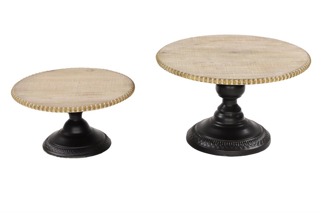 A two-tiered serving stand with a beige wooden tray on top and a black metal base.