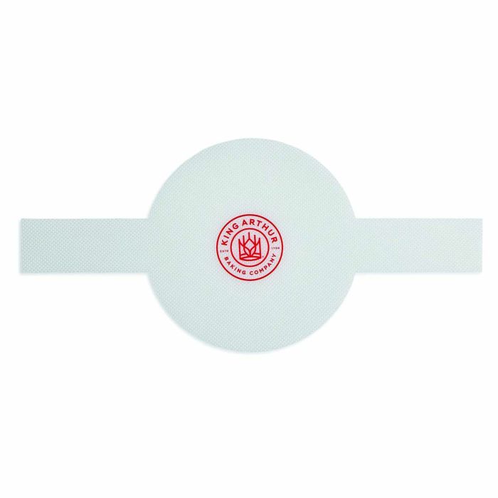 A white round loaf lifter with the King Arthur Baking Company's logo in red.