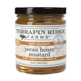 Jar of Terrapin Ridge Farms pecan honey mustard on a white background