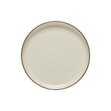 A beige ceramic dinner plate with a plain and simple design.