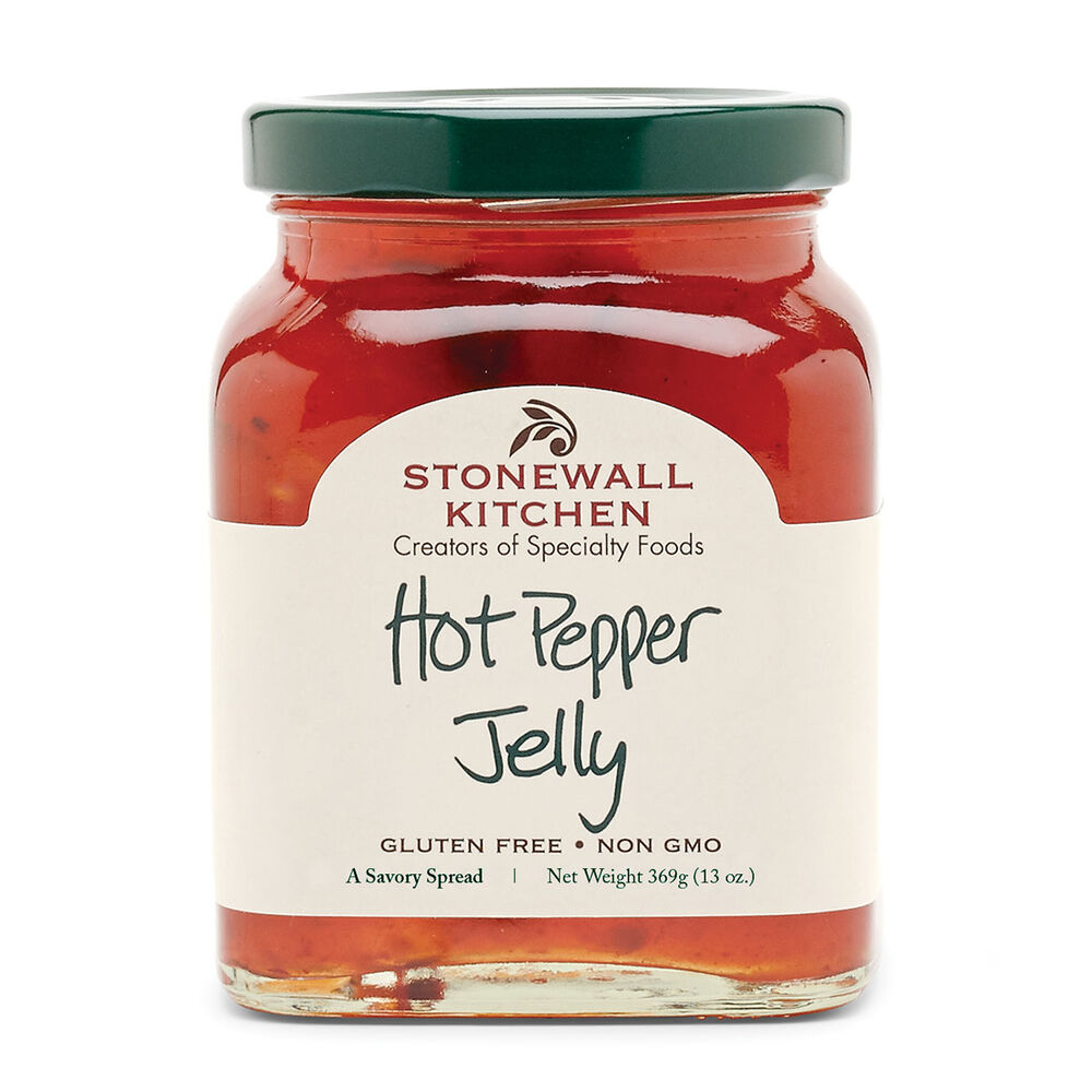 A jar of Stonewall Kitchen Hot Pepper Jelly with the label facing forward. The label indicates that the product is gluten-free and non-GMO.