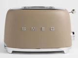 Beige toaster with 'Smeg' branding on a white background