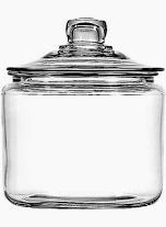 Clear glass jar with a lid on a white background