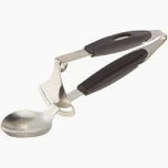 Metallic spoon with black handle on a white background