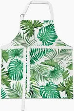 Children's apron with tropical leaf pattern on a white background