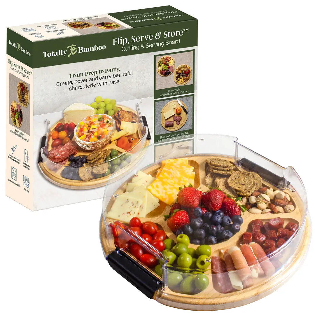 Round bamboo cutting board with food items and packaging labeled 'Totally Bamboo' on a white background.