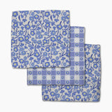 Set of blue floral and checkered fabric swatches on a white background