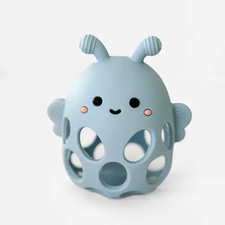 Blue baby teething toy with a smiling face on a white background