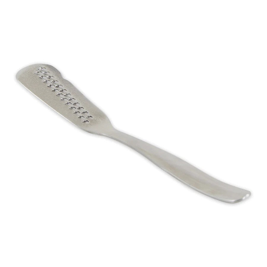 A stainless steel butter shaver with a serrated blade and a flat handle.