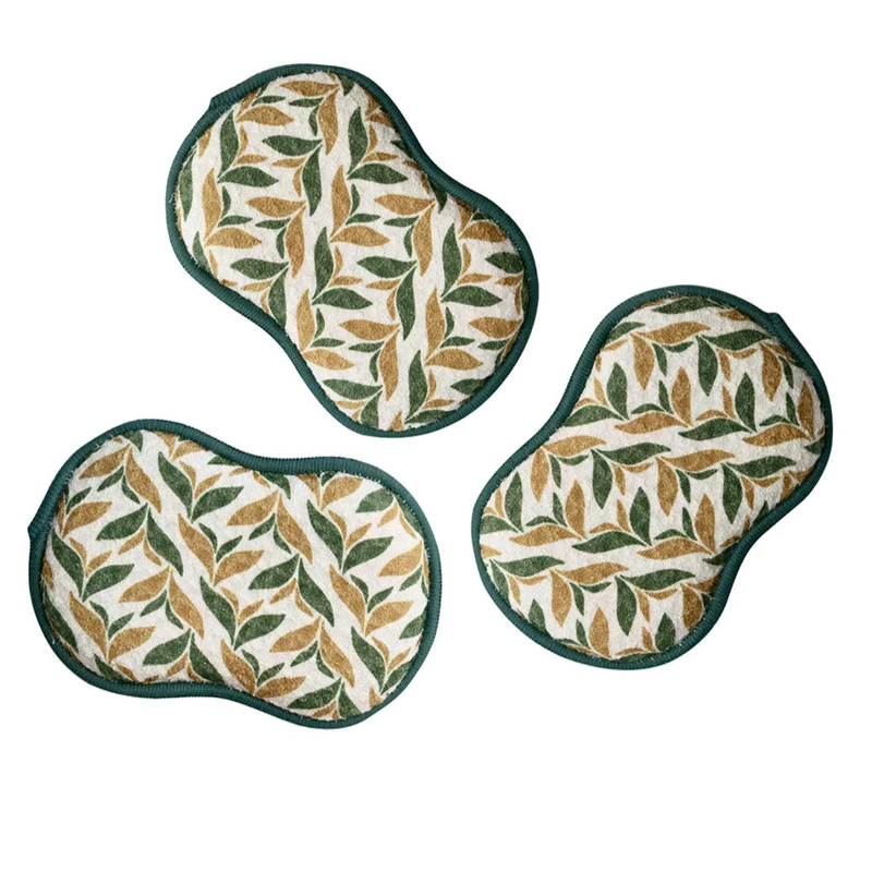 Three reusable cleaning sponges with a spring green and leaf pattern on a white background.