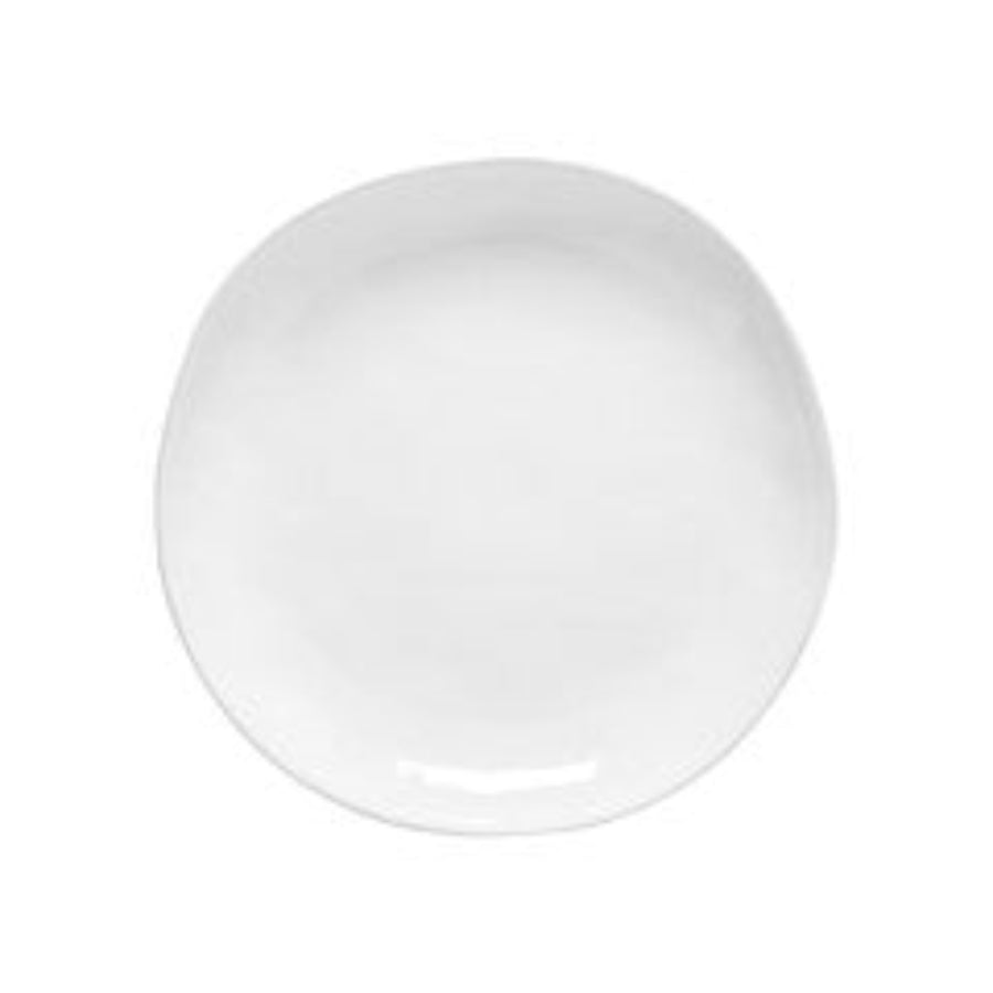 A beige-colored ceramic dinner plate with a simple, solid color design.