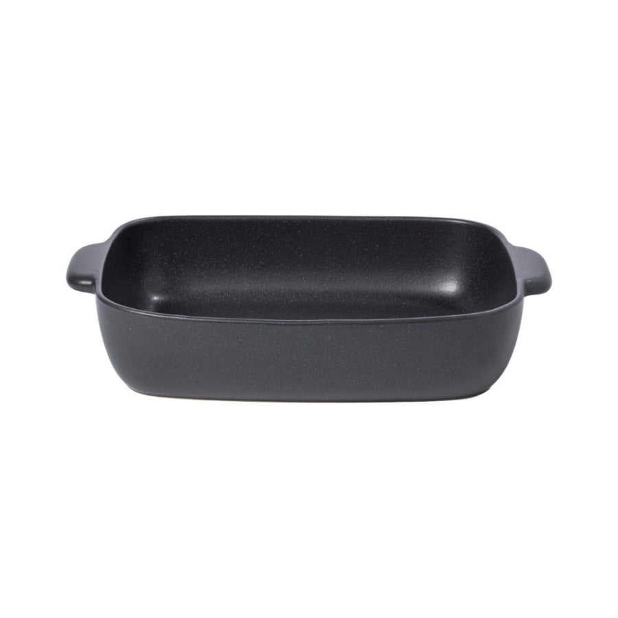 A black rectangular baker with a flat bottom and slightly raised edges.