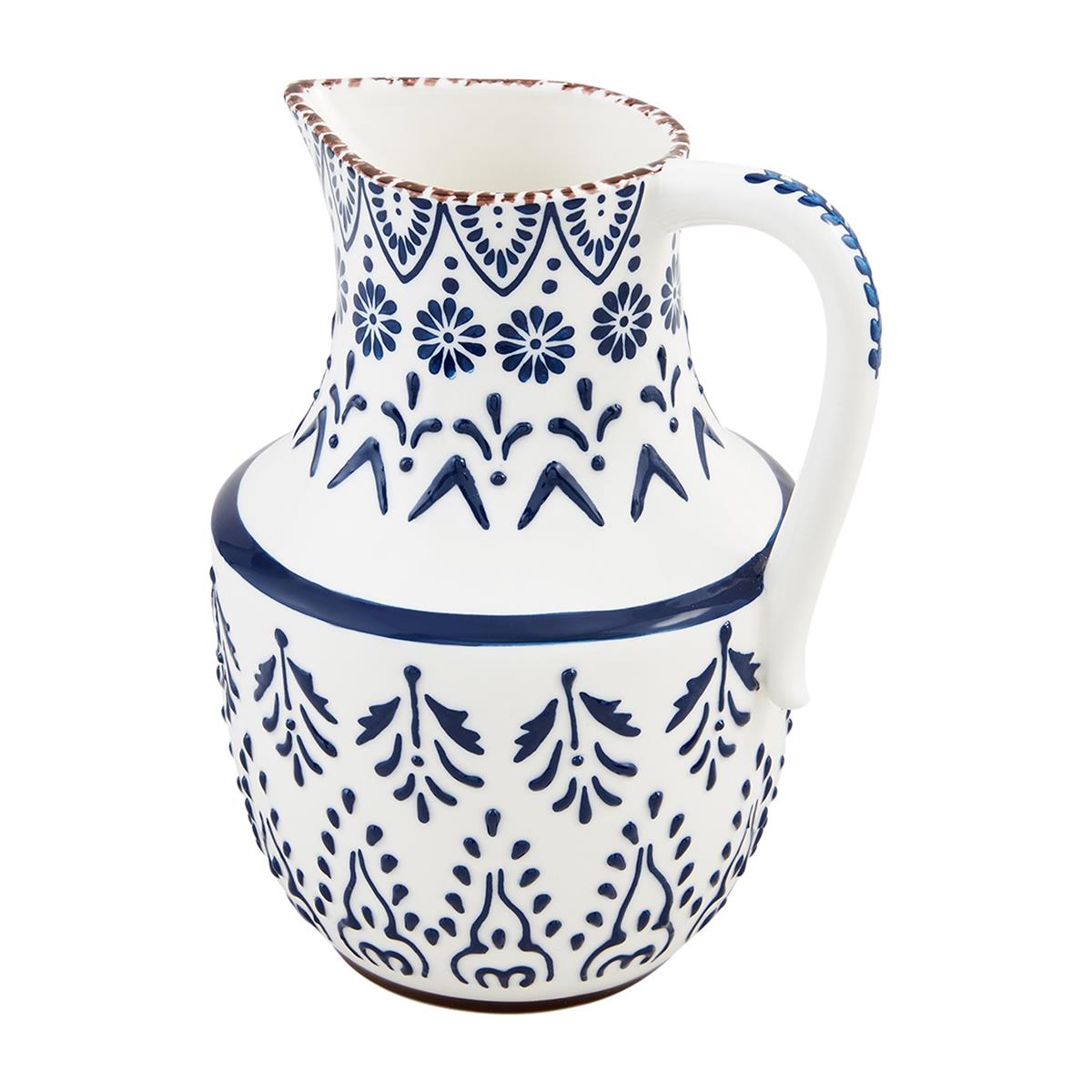 A white and blue painted ceramic pitcher with a traditional floral pattern.