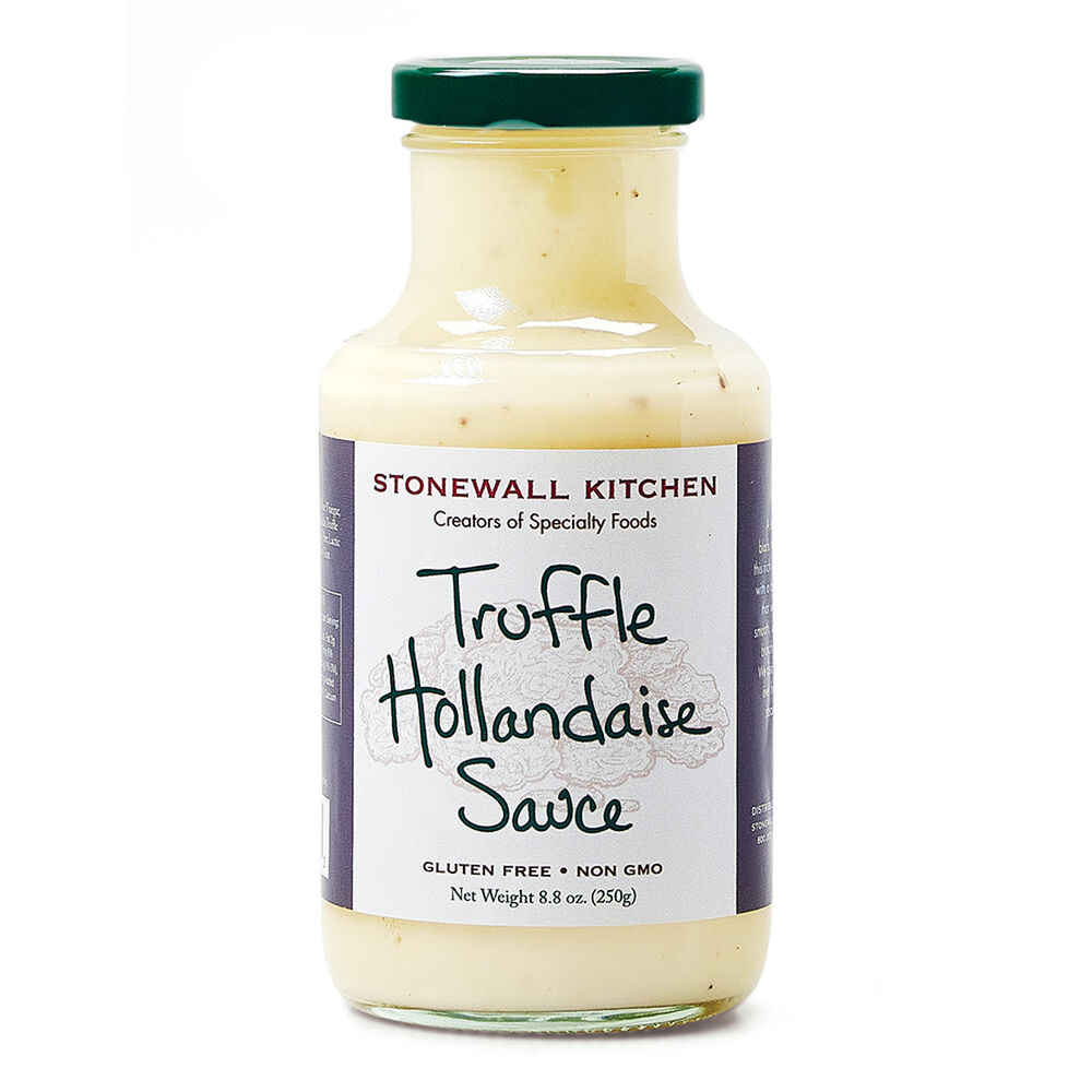 A bottle of Stonewall Kitchen Truffle Hollandaise Sauce with a white label, displaying the product name and dietary information.