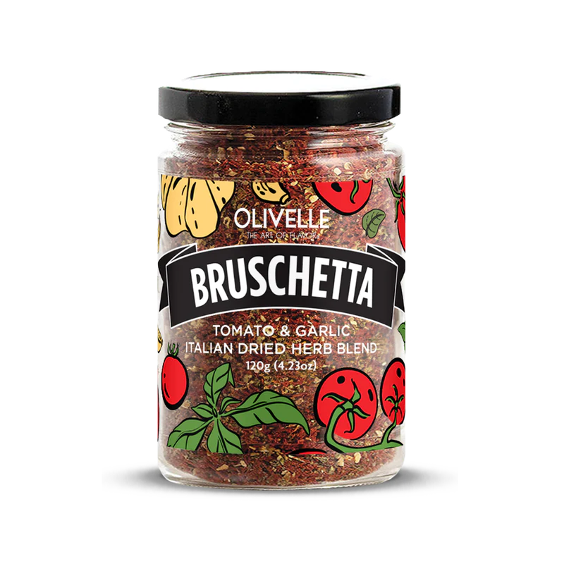 A jar of Olivelle Bruschetta Dried Herb Blend with tomato and garlic flavors, featuring a label with tomato and garlic illustrations and the weight of 12g.