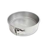 Metal springform pan on a white background
