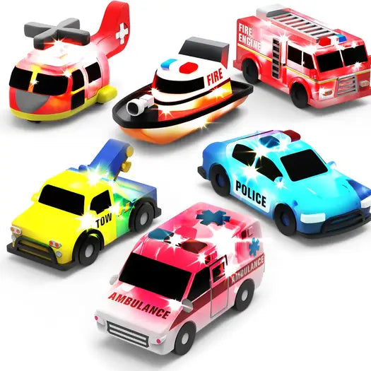 Set of toy emergency vehicles including a helicopter, boat, fire truck, tow truck, police car, and ambulance on a white background.