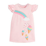 A pink T-shirt dress for kids with a sparkling design, featuring a rainbow and ice cream cone applique, and short sleeves.