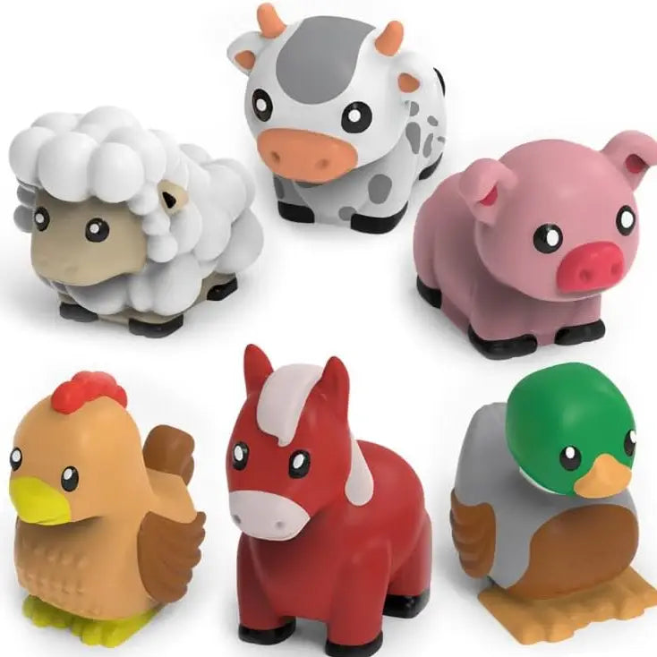 Set of colorful farm animal figurines on a white background