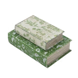 Two decorative boxes with floral patterns on a white background