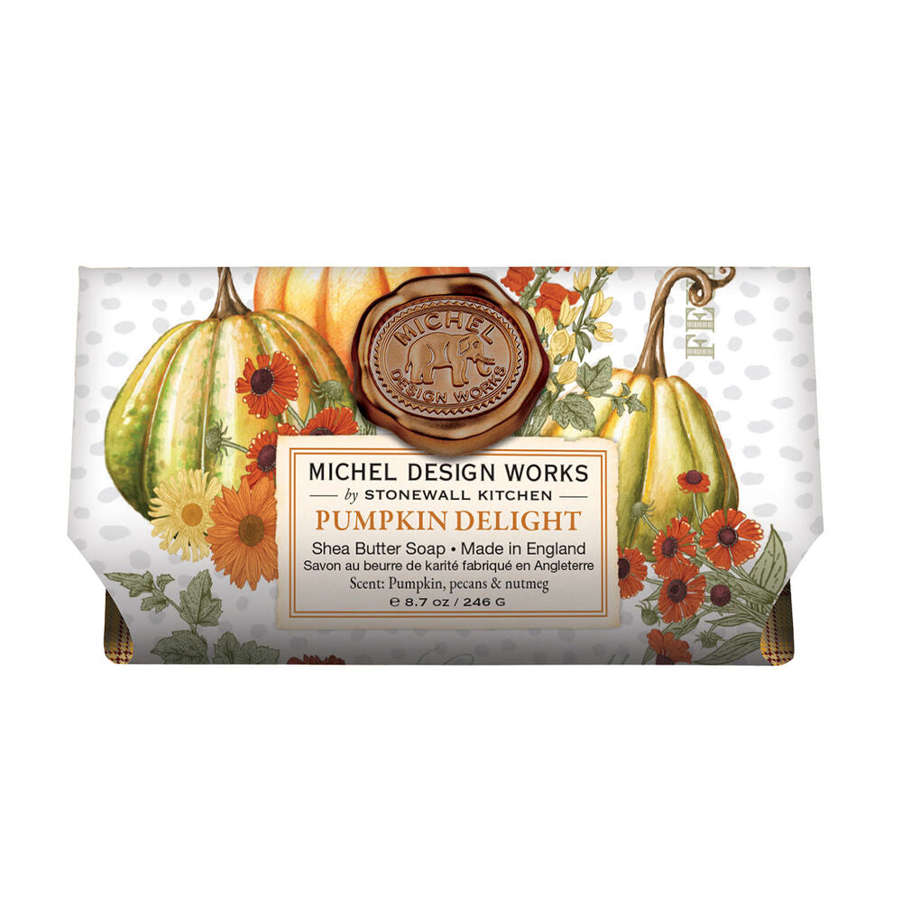 Packaged bar soap with an autumn-themed design, featuring pumpkins and leaves, and a bronze seal stamp.