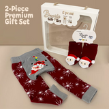 2-piece premium gift set with Santa-themed baby outfit and socks on a beige background