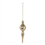 A gold-colored hanging ornament with a spherical shape and decorative elements, including a chain at the top for hanging.