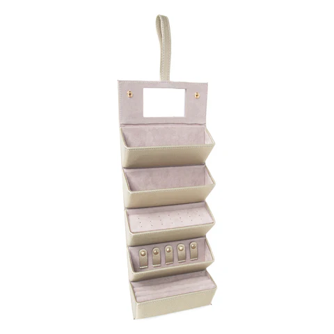 A beige eyewear and jewelry case made of pebbled vegan leather with a soft velour interior, featuring compartments for sunglasses, jewelry, and a built-in mirror.