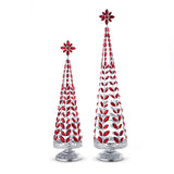 Two conical trees with red and silver jewels, likely made of glass, with one larger than the other.