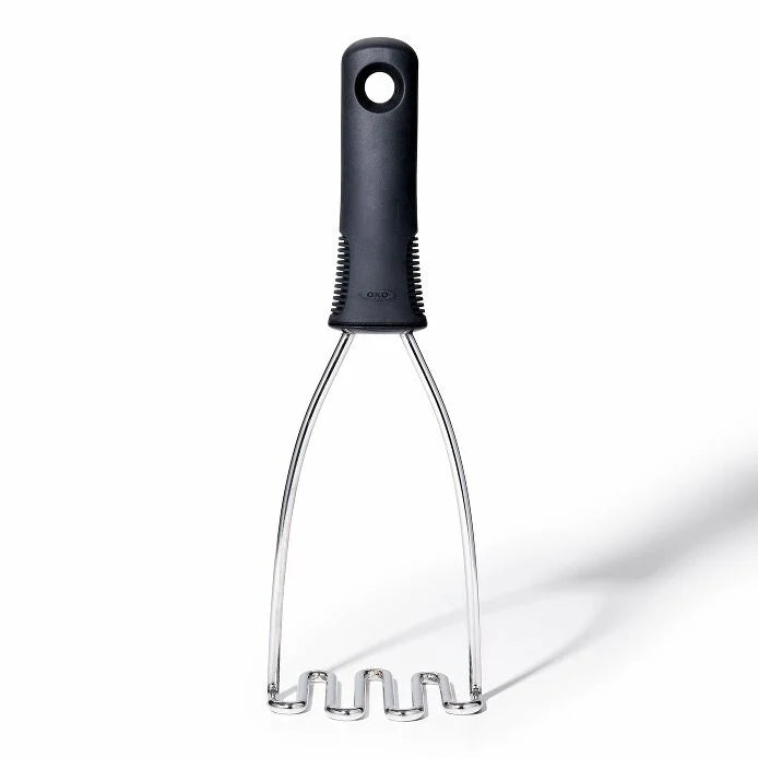 Masher with black handle on a white background