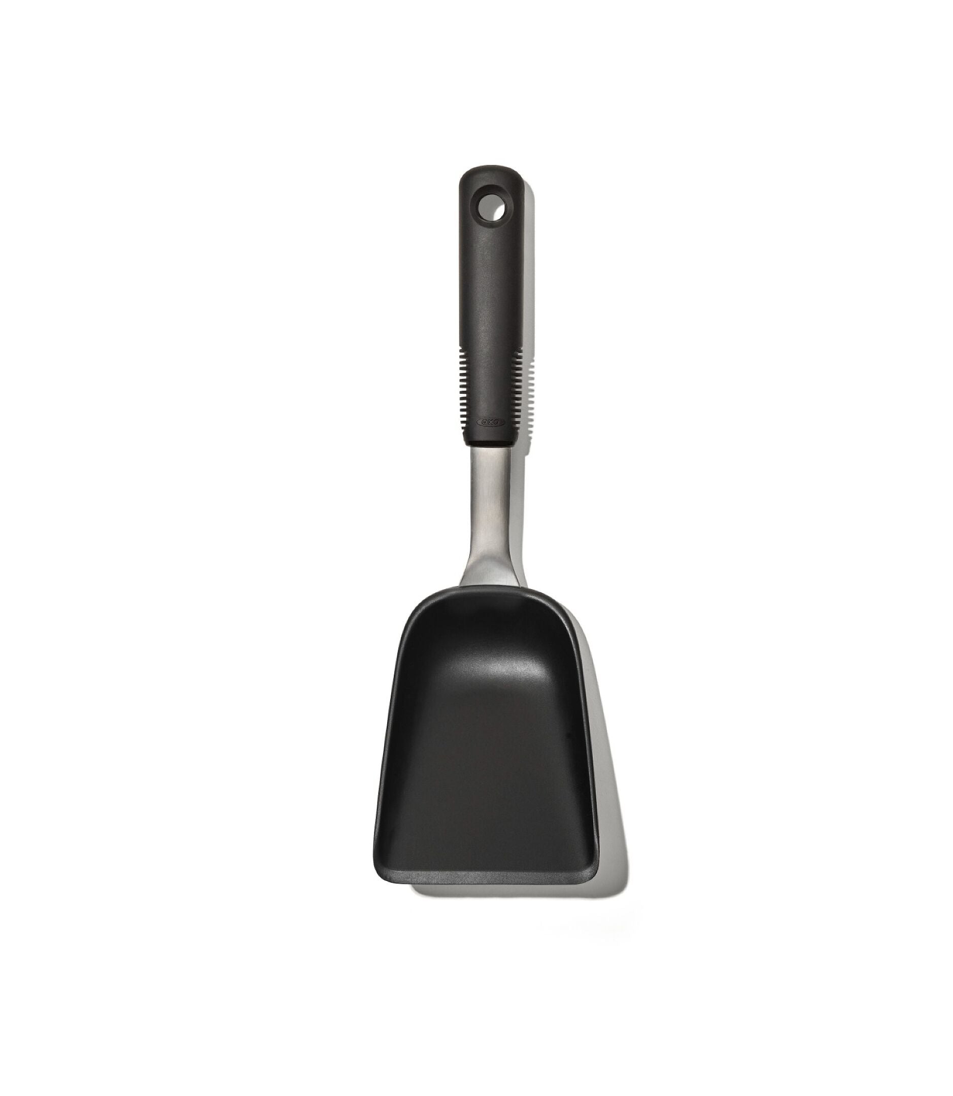 Black scoop with a metal handle on a white background