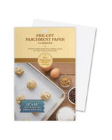 Packaging of Mrs. Anderson's Baking Professional-Quality Unbleached Parchment Paper showing the product and some baked cookies on a baking tray.