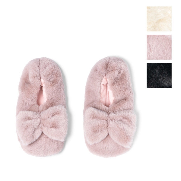 Pair of pink fuzzy slippers with a bow on a white background.