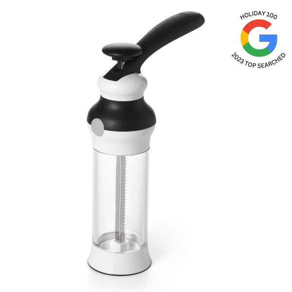 Black and white kitchen tool with a clear container on a white background, featuring Google's 'Holiday 100' logo.