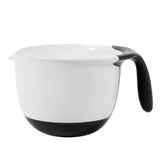 A white OXO GG Batter Bowl with a black handle and spout.