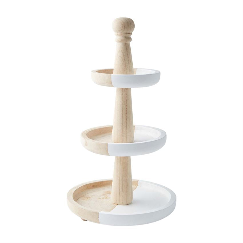 A two-tiered server made of wood and white plastic, with a cake on the top tier and a doughnut on the bottom tier.