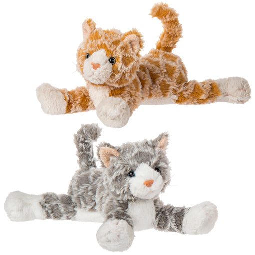 Two plush kittens, one with orange and white fur and the other with grey and white fur, lying down.