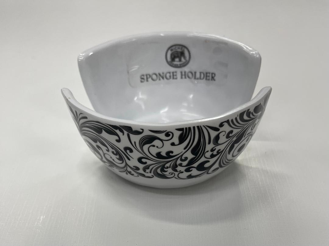 A black and white floral patterned sponge holder