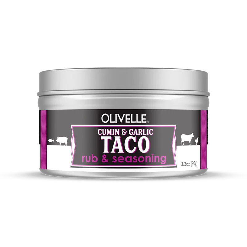 A container of Olivelle Cumin & Garlic Taco Rub & Seasoning, with a label indicating it is a 12 oz product.