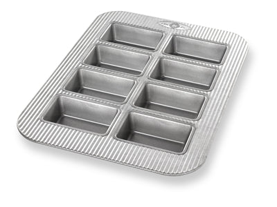 mini loaf pan on white background