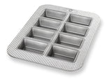 mini loaf pan on white background