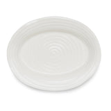 A white oval ceramic platter with a spiral edge design.