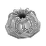 A silver Vaulted Dome Bundt Pan used for baking cakes with a distinctive dome shape.