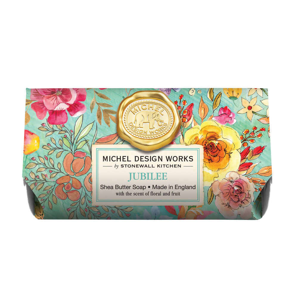 Packaged bar soap with floral design and a label indicating 'Michel Design Works by Stonewall Kitchen Jubilee - Shea Butter Soap, Made in England'.
