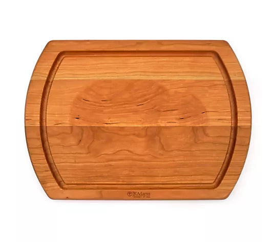 A rectangular wooden cutting board with rounded corners and a recessed border, shown from a top-down view on a white background. The brand name 'K&H' is embossed near the bottom edge.