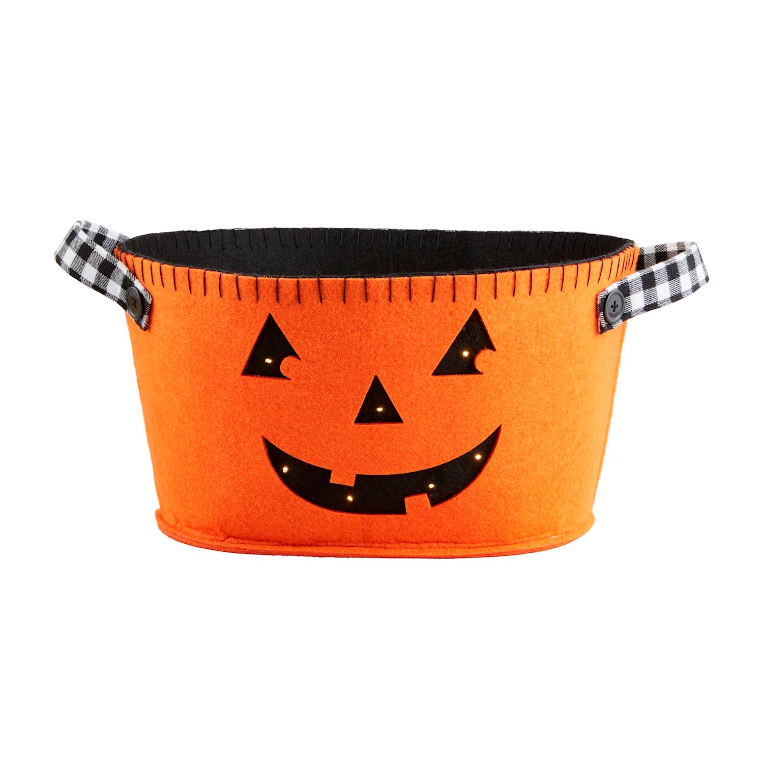An orange felt bucket with a jack-o-lantern face printed on it, featuring black handles with a checkered pattern.