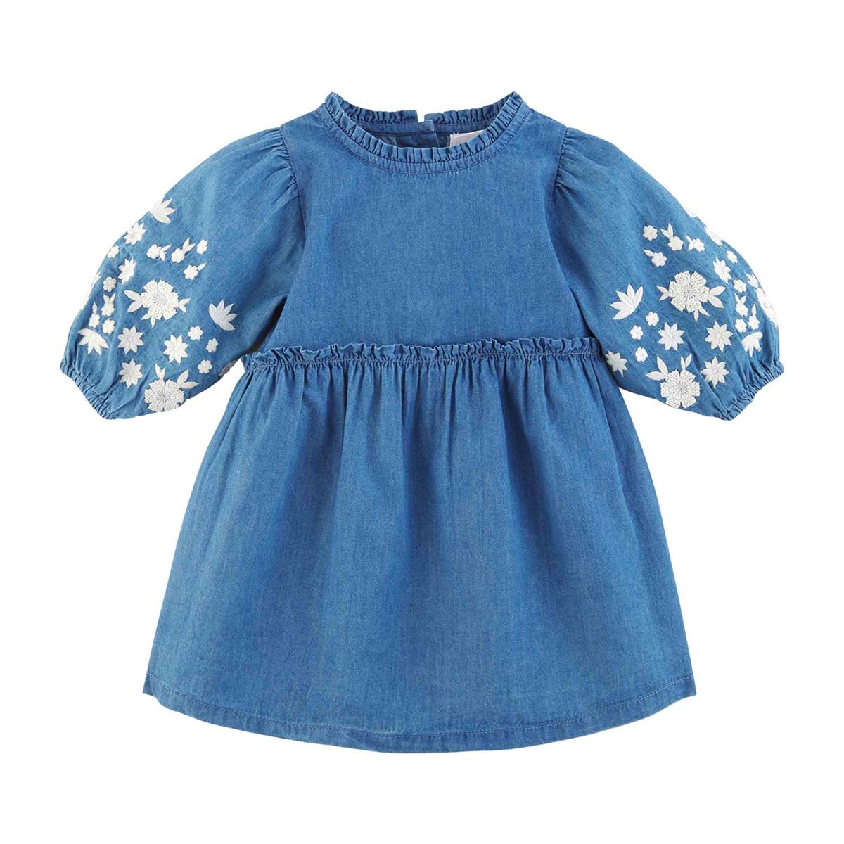 blue dress with white flowers on the sleeve