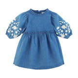blue dress with white flowers on the sleeve