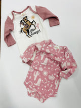 Two baby bodysuits, one with a dinosaur graphic and the text 'LITTLE FOCKARO', and the other with a pattern of cacti and stars.